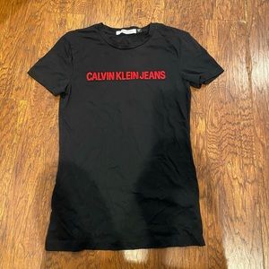 Calvin Klein black T-shirt with red logo.
